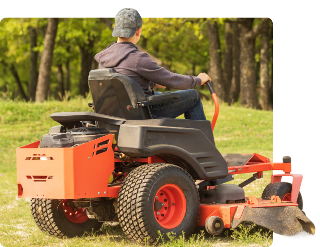 landscaper cutting grass